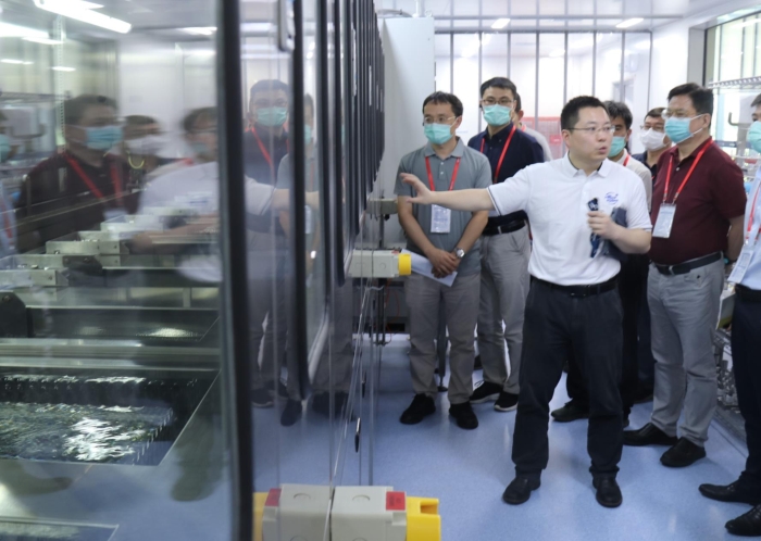 苏州实训基地首期实训班现场，图为参训检查员进行模拟现场检查。